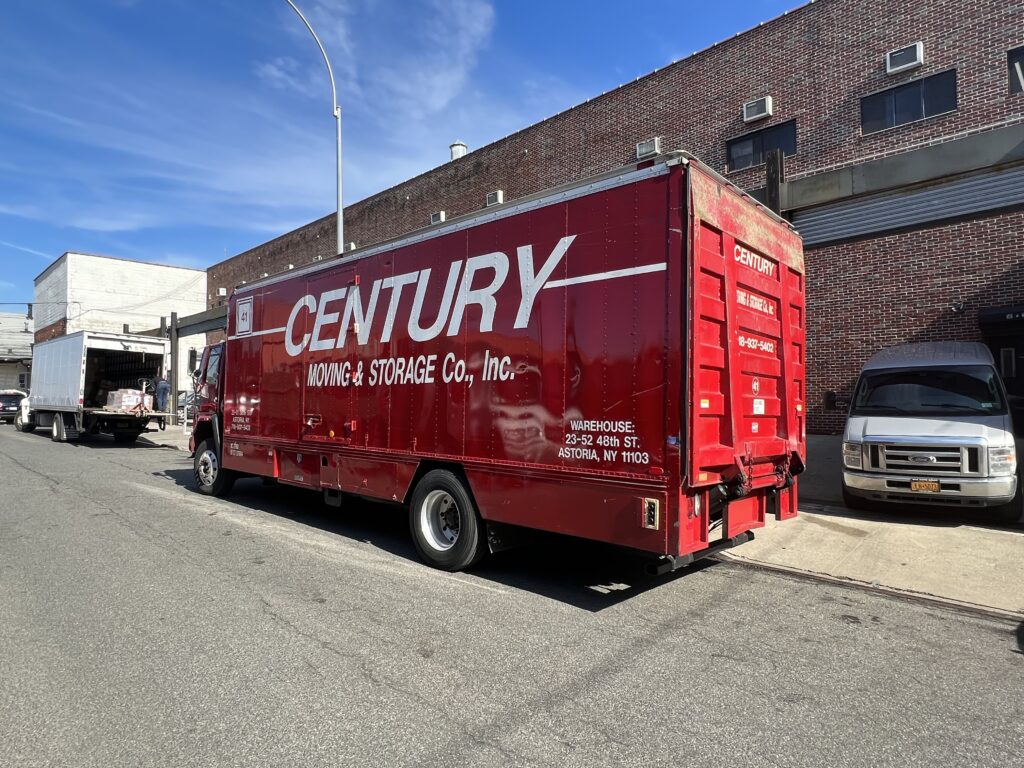 Century Moving & Storage Truck Parked On Road